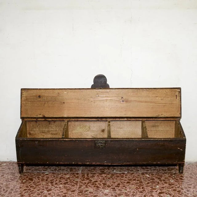 Solid fir wood storage crate from the 1800s with special sloping top, internally divided into four compartments. Measures...