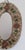 Ceramic flower-motif wall mirror with glazed leaves attributed to la roue, vallauris, france (circa 1960s). A charming,...