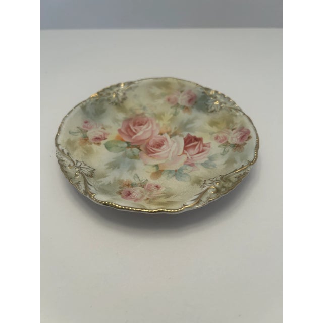 Rose Tapestry is molded with material on the outside to give it a “tapestry texture” when fired. The Rose Decoration is...