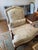 A rare, gorgeous pair of French Provincial Louis XV-style lounge chairs, crafted by Baker Furniture in the USA circa...