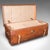 This is a large antique trunk case. An English, leather steamer or shop display suitcase, dating to the Edwardian period,...