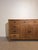 Impressive and highly functional solid wood sideboard, combining warm natural tones with a clean, timeless design. This...