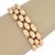 This Three Row 14k Yellow Gold Bar Link Bracelet is a classic piece of vintage jewelry that exudes elegance and...