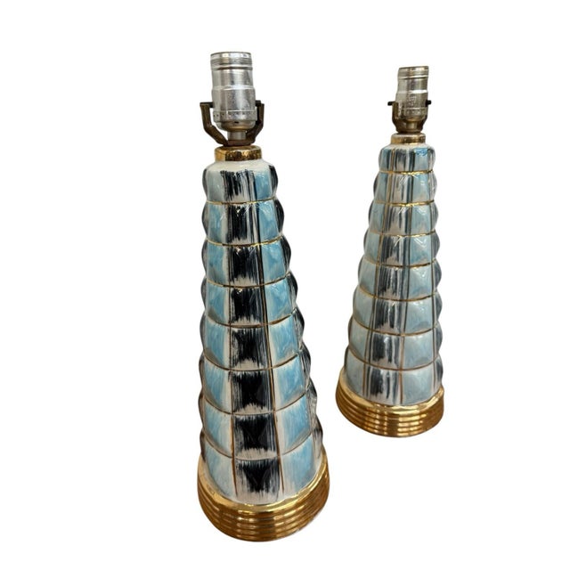 These Pair Vintage MCM Ceramic Lamps are a stunning representation of Mid-Century Modernism from the 1950s. The abstract...