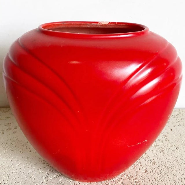 The Postmodern Red Ceramic Vase by Haeger is an exquisite piece of art that epitomizes the daring and unconventional...