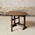 This 19th Century French Oak Table de Vin features a beautifully aged circular top with a warm, timeworn patina and subtle...