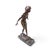 - Bronze nude young woman leaning forward into the wind on a rocky base, arms thrown wide and back - Western Europe, most...