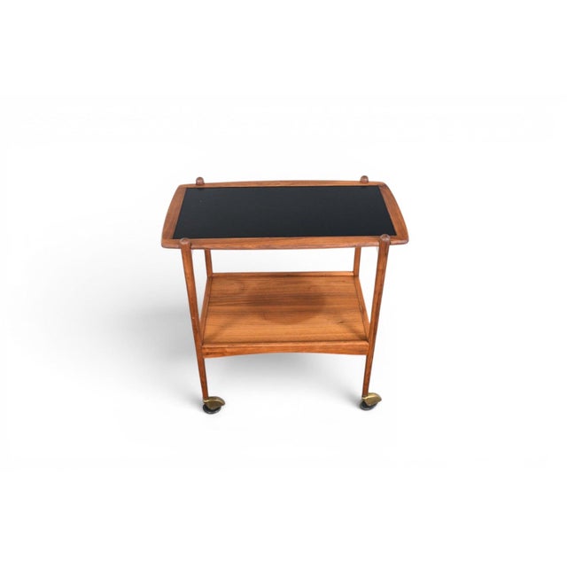 Origin: Denmark Designer: Unknown Manufacturer: Unknown Era: 1960s Dimensions: 32″ wide x 19.5″ deep x 32″ tall