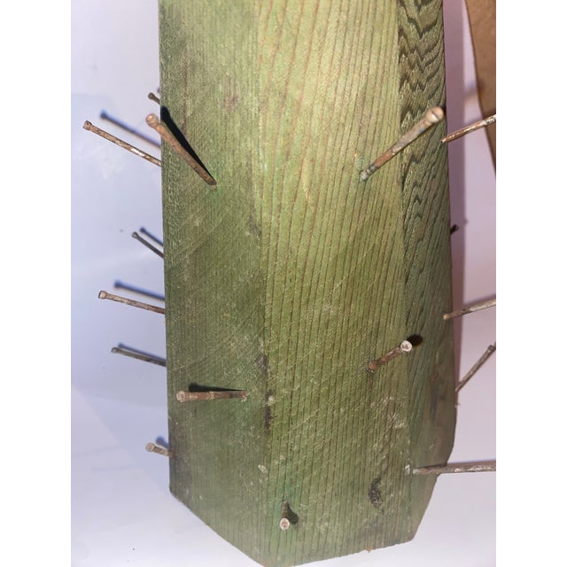 An authentic older piece . Does have some weight noted patina changes throughout on nails . Folk art encompasses a wide...