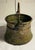 Antique copper & iron bucket for water with elaborate cartouches etched around sides bulbous shaped bottom tapering up...