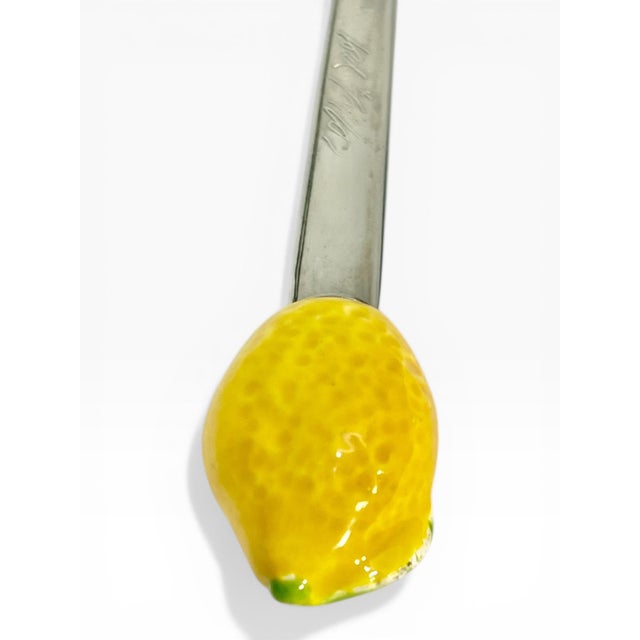 Playful and stylish, this vintage set of six long cocktail spoons by Lord & Taylor features charming hand-painted ceramic...