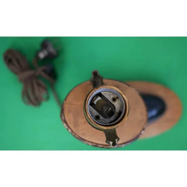 Boot Sz: 9"H x 6"L x 2 1/4"W Overall Sz w/ finial: 21"H x 8"W w/ oval plinth base Provenance: The Susie Hilfiger...