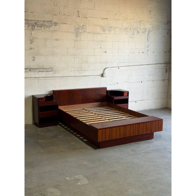 This queen platform bed frame boasts a sleek profile and exceptional craftsmanship. The expansive headboard incorporates...