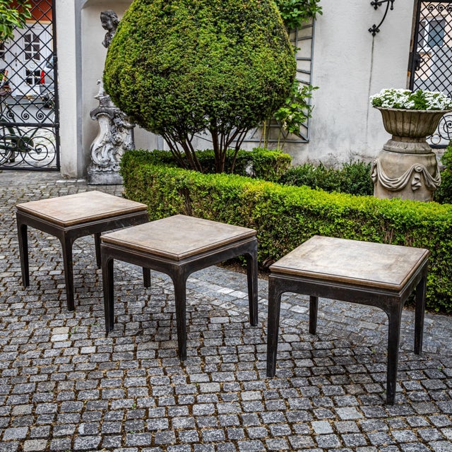 Set of three side tables with square tops, straight legs, and slightly rounded aprons. The newly applied anthracite gray...
