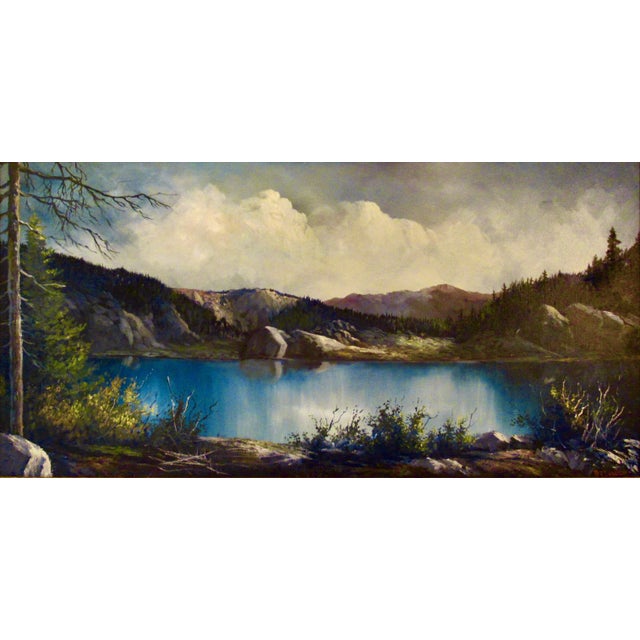 This artwork titled "Summer Stillness, Lake Tahoe" c.1970, is an oil painting on canvas by noted California artist Bill...