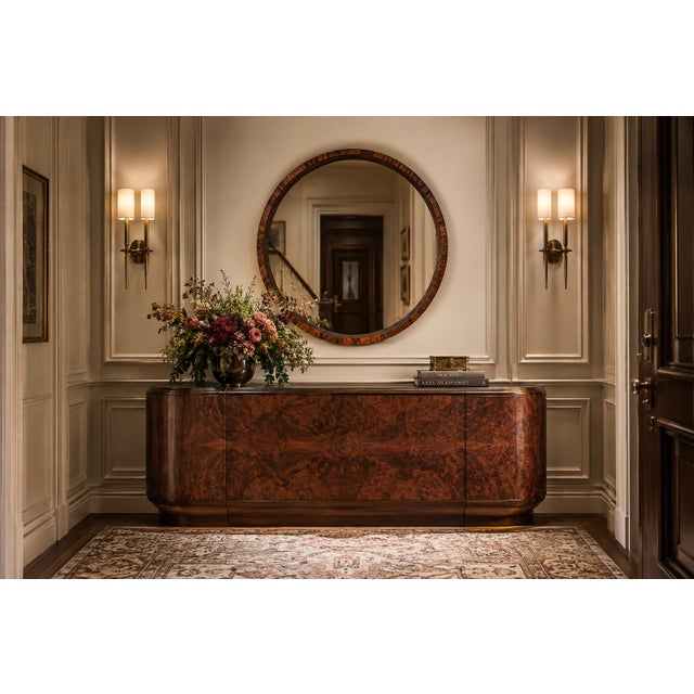 A commanding study in proportion and material, this monumental 39" diameter Brazilian Modern mirror from the 1960s...