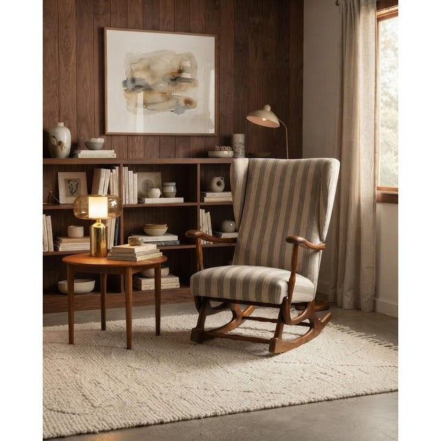 A magnificent and exceptionally rare fully refurbished vintage "Rumba" style wingback rocking chair (echoing iconic...
