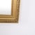 Antique mirror with a gilded frame dating from the 1890s. The mirror features a classic appearance with decorative details...