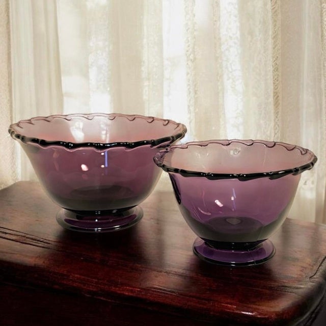 This pair of American glass serving bowls was produced by the Fostoria Glass Company in the well known Century pattern,...