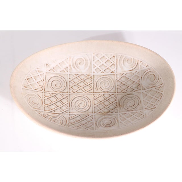 Mid Century pottery bowl made in Germany by Jasba as part of the Ethno series, circa 1950/60's. This piece feature a...