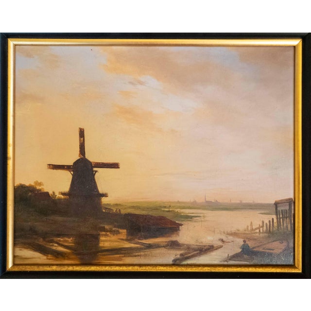 We are selling this Dutch Old Master style oil painting landscape. This landscape featuring a Windmill with a town in the...