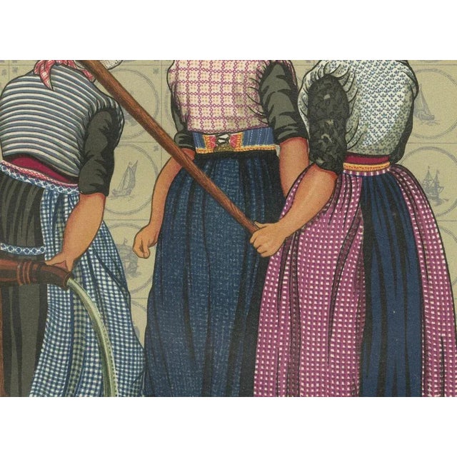 Man and Woman of Urk in Sunday Dress with Broad Hats, 1932 This striking hand-colored lithograph is Plate XVII from the...