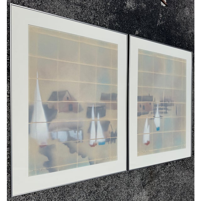 The artworks shown in the image is a limited edition diptych serigraphs set titled "Inlet Harbour I & II" by the American...
