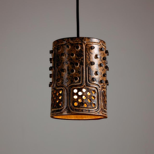 A truly classic piece of Danish design and craftsmanship. A ceramic pendant designed by Jette Hellerøe for Axella in the...