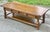 Vintage Ethan Allen solid oak Jacobean style coffee table. Two dovetailed drawers sit below the plank style top. Boldly...