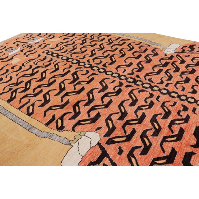 Hand-knotted in wool, this 10x14 modern tiger pictorial rug is a bold addition to the Rug & Kilim exclusive Tiger line. On...