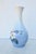 Royal Copenhagen Rose vase dated 1964 by backstops. Soft blue soft focus design in a porcelain bottle vase. Med blue...