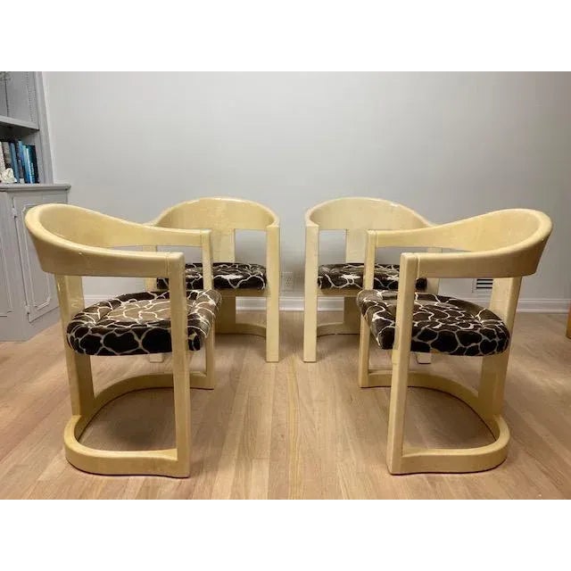 Set of four authentic vintage 1980's Karl Springer LTD, "Jackie O" / Onassis chairs in lacquered goatskin parchment....