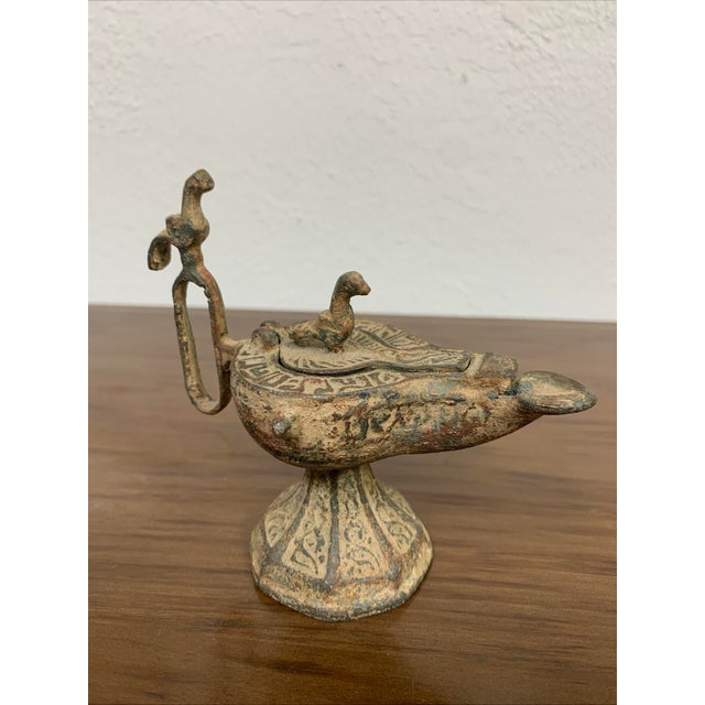 This exquisite antique bronze incense burner or lantern showcases fine Middle Eastern craftsmanship, likely dating to the...