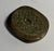 Decorative antique French button mold to use as a paperweight.