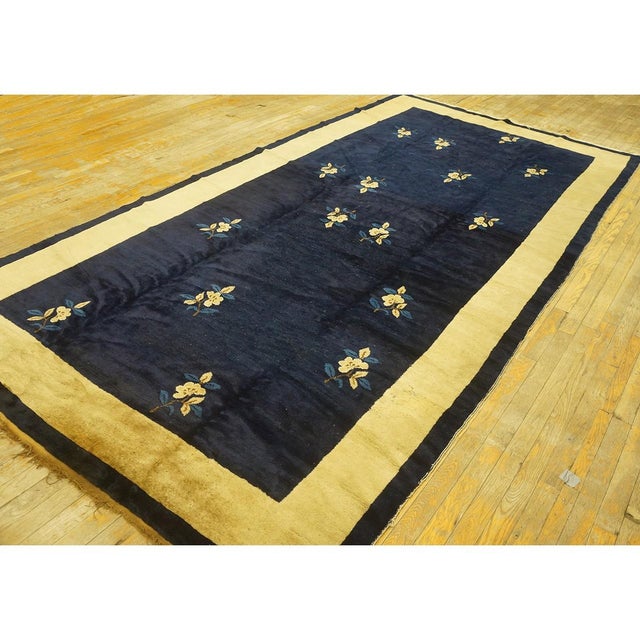 Small Scatter Size Rugs (5.09ft x 11.03ft), Circa Date: 1920s. This exceptional hand-knotted wool piece, dating to the...