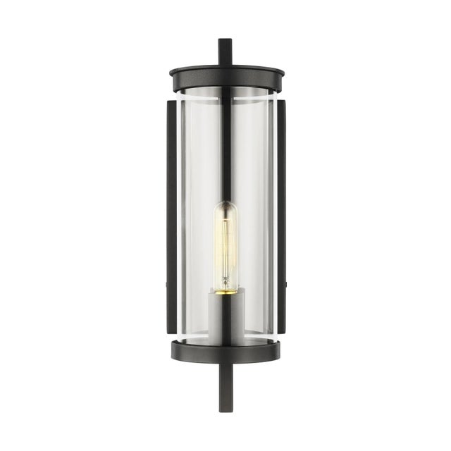 The Eastham one light outdoor wall fixture in textured black by Chapman & Myers is designed with an upright square metal...