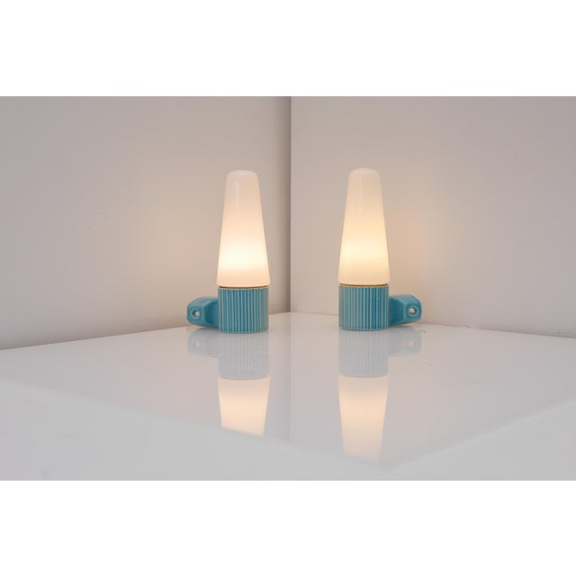 A beautifully preserved pair of mid-century bathroom wall sconces designed by hans-agne jakobsson for the iconic swedish...