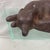 Antique iron reclining fox door stop. This doorstop has not been painted. Very heavy with good detail. He looks like he is...