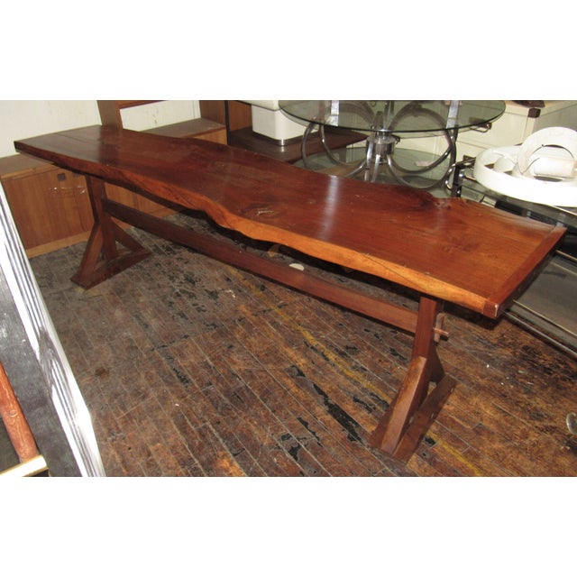 Beautiful live edge table usable as a dining or console table. Terrific Nakashima style.