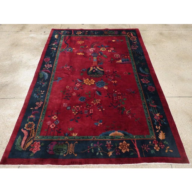 A vintage Chinese Art Deco accent carpet handmade during the mid-20th century. Measures: 6' 0" x 8' 9"