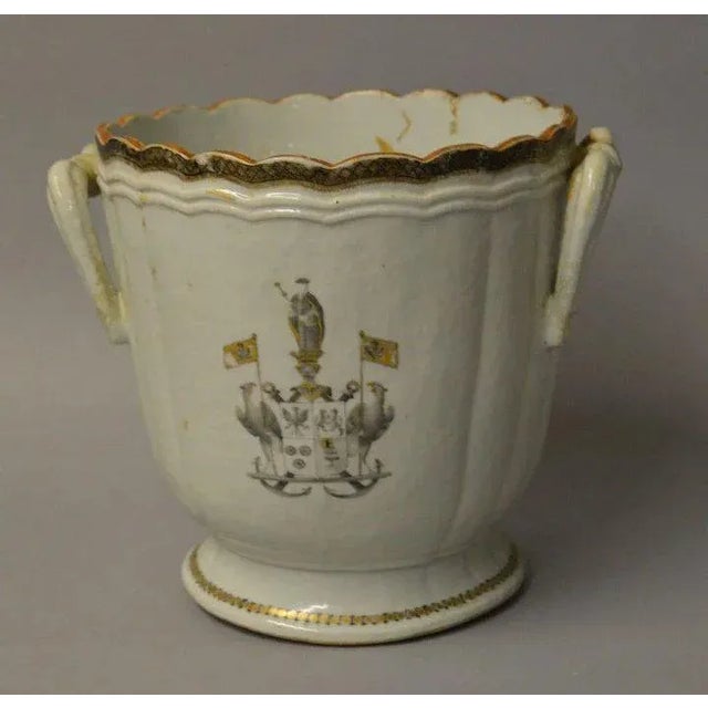 Antique 18th c. Chinese export porcelain armorial wine bottle cooler. Heavily potted with applied handles. Each side...
