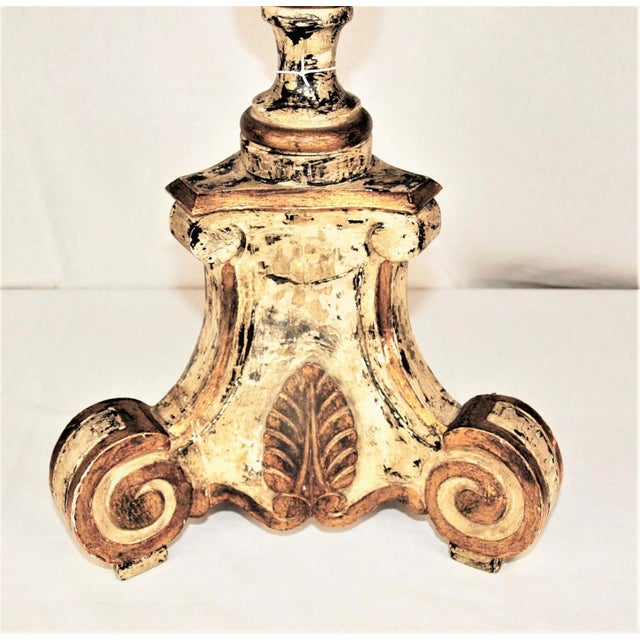 An Vintage pair of painted tall candlesticks. Used as candlesticks they are also drilled though to use as lamp base....