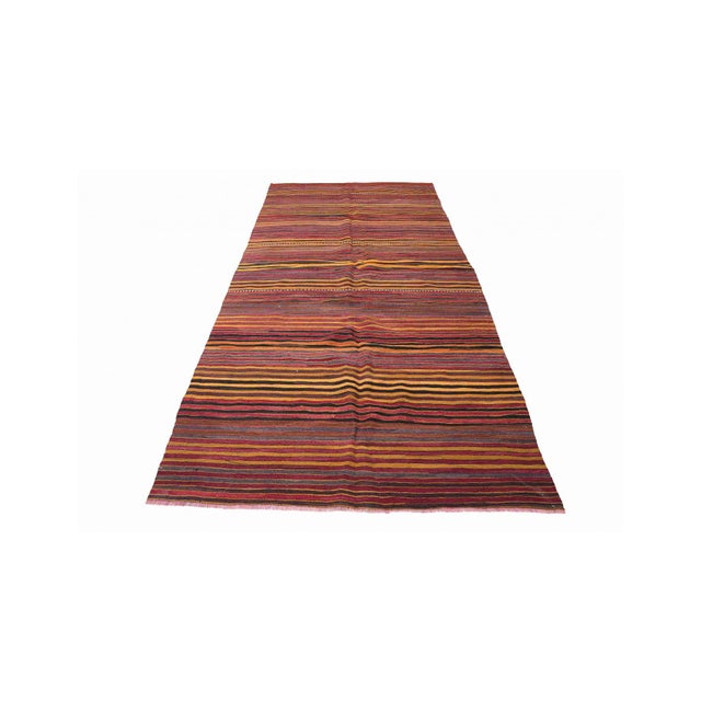 Handwoven vintage striped decorative kilim rug from Denizli region of Turkey. Approximately 50-60 years old. In very good...