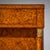 Pair of sideboards or demi-buffets in the Charles X style, each with two doors and a drawer. The pieces rest on partially...