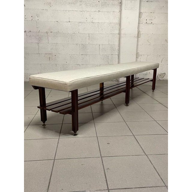 Large 1960s bench in teak wood, brass tips and new stain-proof and washable fabric covering. Elegant, sober and perfect,...