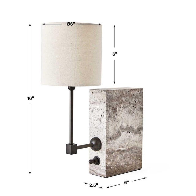Create a warm and inviting glow to any bookshelf or desk top. Similar in size to a book, nestle this mini lamp between...
