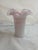Bring timeless elegance to your home with this beautiful vintage Fenton Pink Crest Milk Glass Vase. Expertly handcrafted...