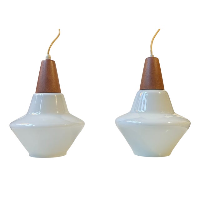 Danish Modern White Opaline Glass and Teak Pendant Lamps by Holmegaard, 1960s, Set of 2 For Sale