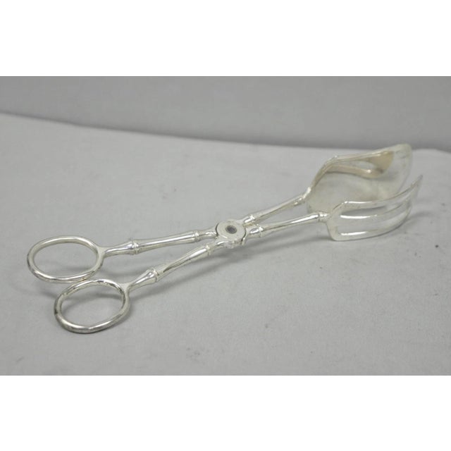 Vintage Silver Plated Hollywood Regency Faux Bamboo Scissor Style Pastry Cake Serving Tongs. Circa Mid 20th Century....