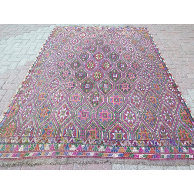 This beautiful rug is from westhern of Turkey. About 60 years old. This beautiful Jejim kilim weaved with embroidered...